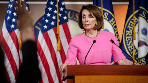 The video montage began with House Speaker Nancy Pelosi, D-Calif., walking through the Capitol flanked by security guards at 2:23 p.m. ET after the Capitol was breached.